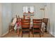 Casual dining area with light blue walls and wood dining furniture at 1901 Ashcraft Ave, Monroe, NC 28110