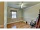 Charming bedroom with hardwood floors and a window at 211 Roy Eaker Rd, Cherryville, NC 28021