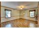 Bright bedroom with hardwood floors and large windows at 211 Roy Eaker Rd, Cherryville, NC 28021