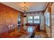 Dining room with brick accent wall at 211 Roy Eaker Rd, Cherryville, NC 28021