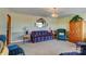 Cozy living room featuring striped sofa and wood accents at 211 Roy Eaker Rd, Cherryville, NC 28021