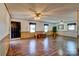 Large living room with hardwood floors and wood paneling at 211 Roy Eaker Rd, Cherryville, NC 28021