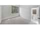 Bright bedroom with private bathroom and grey carpet at 2714 Selwyn Ave, Charlotte, NC 28209