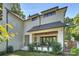 Back exterior view of a charming two story home with a covered patio at 2714 Selwyn Ave, Charlotte, NC 28209