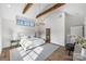 Luxurious main bedroom with wood beams, wall paneling, and ensuite bath at 2714 Selwyn Ave, Charlotte, NC 28209