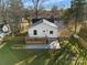 Rear of house showing deck, fenced yard, and garden at 30 Walnut Nw Ave, Concord, NC 28027