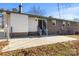 Grey steps leading to a back patio with a spacious backyard at 322 Timber Rd, Iron Station, NC 28080