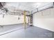 Unfinished basement with HVAC unit and ample storage space at 322 Timber Rd, Iron Station, NC 28080