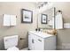 Clean bathroom with white vanity, new fixtures, and stylish decor at 322 Timber Rd, Iron Station, NC 28080