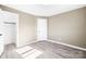 Bright bedroom with wood-look floors and ample closet space at 322 Timber Rd, Iron Station, NC 28080