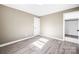 Bright bedroom with a closet and wood-look floors at 322 Timber Rd, Iron Station, NC 28080