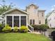 House's back elevation, showing a large screened porch at 3277 Richards Xing, Fort Mill, SC 29708