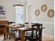 Bright dining room with wooden table and chairs, hardwood floors at 3277 Richards Xing, Fort Mill, SC 29708