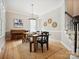 Formal dining room with wooden table, bench, and hardwood floors at 3277 Richards Xing, Fort Mill, SC 29708