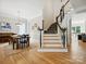 Elegant staircase with dark wood accents and a light-colored railing at 3277 Richards Xing, Fort Mill, SC 29708