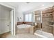 Bathroom with corner soaking tub and walk-in shower at 3405 Taviston Dr, Waxhaw, NC 28173