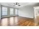 Spacious bedroom with hardwood floors and multiple windows at 3405 Taviston Dr, Waxhaw, NC 28173