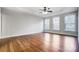 Bright bedroom with hardwood floors and three windows at 3405 Taviston Dr, Waxhaw, NC 28173