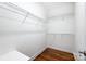 Large walk-in closet with wire shelving and wood floors at 3405 Taviston Dr, Waxhaw, NC 28173