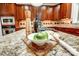 Granite kitchen counter with wood cutting board and bowl of limes at 3405 Taviston Dr, Waxhaw, NC 28173