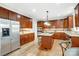 Kitchen with stainless steel appliances and hardwood floors at 3405 Taviston Dr, Waxhaw, NC 28173