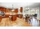 Spacious kitchen with granite countertops, stainless steel appliances, and hardwood floors at 3405 Taviston Dr, Waxhaw, NC 28173