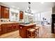 Kitchen island with granite countertop and seating for two at 3405 Taviston Dr, Waxhaw, NC 28173