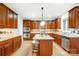 Eat-in kitchen with hardwood floors and stainless steel appliances at 3405 Taviston Dr, Waxhaw, NC 28173