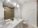 Double vanity bathroom with a walk-in shower at 4027 Capital Ridge Ct # 10, Charlotte, NC 28205