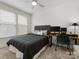 Bedroom with a workspace and a queen bed at 4027 Capital Ridge Ct # 10, Charlotte, NC 28205