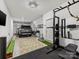 Finished garage with home gym setup and ample storage at 4027 Capital Ridge Ct # 10, Charlotte, NC 28205