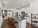 Modern kitchen with white cabinets, gray counters, and island at 4027 Capital Ridge Ct # 10, Charlotte, NC 28205