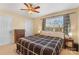 King-size bed in spacious bedroom with ceiling fan at 415 Kilberry Ln, Fort Mill, SC 29715