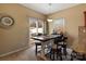 Bright breakfast nook with table and chairs, leading to a patio at 415 Kilberry Ln, Fort Mill, SC 29715