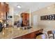 Kitchen with granite countertops and breakfast bar at 415 Kilberry Ln, Fort Mill, SC 29715