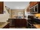 Kitchen with granite counters, stainless steel appliances, and wood cabinets at 415 Kilberry Ln, Fort Mill, SC 29715