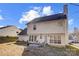 View of a two-story home's backyard at 502 Long Creek Pkwy, Charlotte, NC 28214