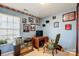 Home office with desk, chair, and built-in shelving at 502 Long Creek Pkwy, Charlotte, NC 28214