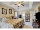 Bright bedroom featuring a king-size bed and ample closet space at 502 Long Creek Pkwy, Charlotte, NC 28214