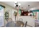 Casual dining area with round table and chairs, offering a view of the kitchen at 502 Long Creek Pkwy, Charlotte, NC 28214