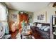 Cozy living room features a brown sofa, coffee table, and decorative accents at 502 Long Creek Pkwy, Charlotte, NC 28214