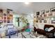 Spacious living room with comfortable seating and a view into the dining area at 502 Long Creek Pkwy, Charlotte, NC 28214