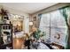 Bright and spacious living room with hardwood floors and a view to dining area at 502 Long Creek Pkwy, Charlotte, NC 28214