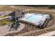 Aerial view of community pool, playground, and clubhouse at 522 Zermatt Ct, Monroe, NC 28112