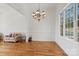 Bright dining room with hardwood floors and chandelier at 5774 Crown Ter, Hickory, NC 28601