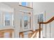 Bright entryway with hardwood floors, stained glass door and sunlit windows at 5774 Crown Ter, Hickory, NC 28601