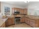 Modern kitchen with granite countertops and stainless steel appliances at 5774 Crown Ter, Hickory, NC 28601