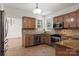 Modern kitchen with granite countertops and stainless steel appliances at 5774 Crown Ter, Hickory, NC 28601