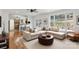 Open-concept living room with a plush sectional sofa and seamless flow to the kitchen at 5774 Crown Ter, Hickory, NC 28601