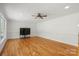 Bright living room with hardwood floors and large windows at 5774 Crown Ter, Hickory, NC 28601